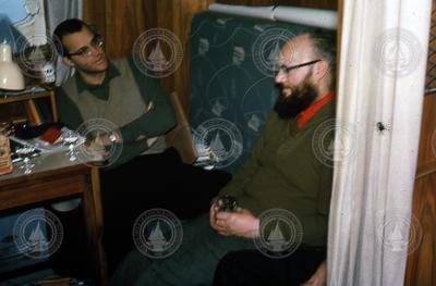 Red Wright and John Swallow in ship's lounge.