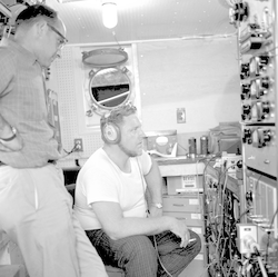 Working with equipment below deck of Gosnold