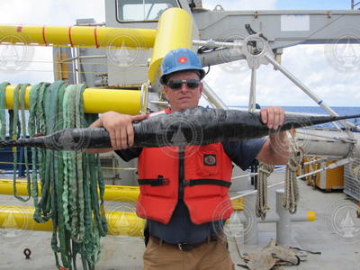 Jim Dunn holds a NOMAD buoy mooring line.