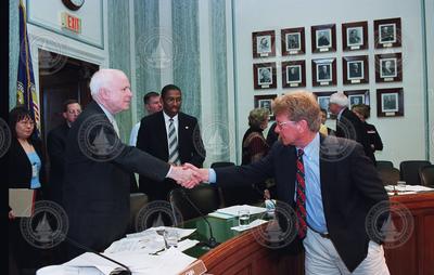 Senator  John McCain greeting Bill Curry