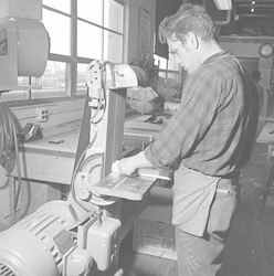 Art Costa working in carpenter shop.