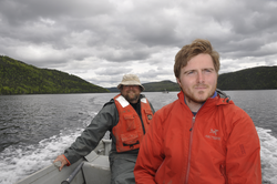 Michael Toomey and Chris Maio (back) in the coring pontoon boat.