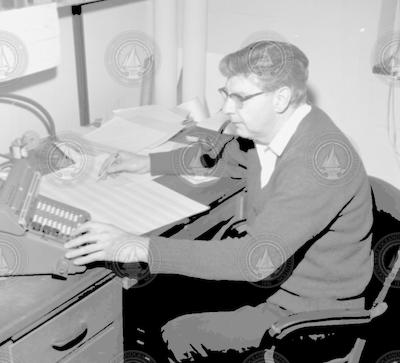 Andrew Bunker with adding machine