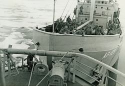 Researchers hitching a ride from U.S. Coast Guard icebreaker vessel AG-129.