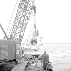 Sea Cliff suspended by large crane