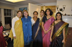 A group of women wearing saris for Diwali Night.