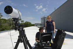 Jason Kapit and Anna Michel testing a laser spectrometry system.