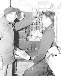 Vaughan Bowen (left) and John Schilling below deck of Crawford
