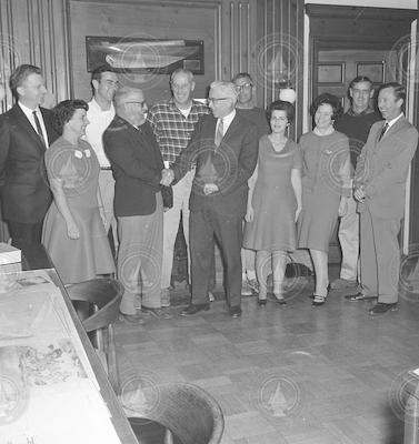 Paul Fye (right center) with a group of people.