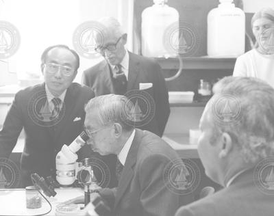Group surrounding visiting Emperor Hirohito.