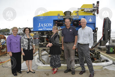 The NSF director's tour group out on the dock.