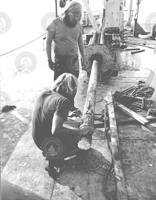 Roger Flood and Jim Broda (foreground) extracting core.