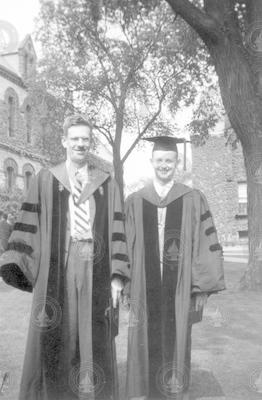 Robert Cole [left] at a graduation ceremony