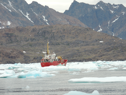 Ferry and cargo ship Johanna Kristina moving through heavy sea ice.