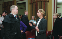 Ruth Curry (right) speaking with one of the guests at the briefing