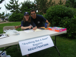 Ann Devenish and Mike Lagrassa at the registration table