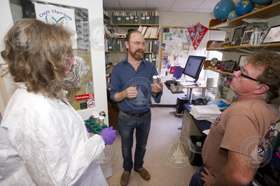 Erin Black, Ken Buesseler, and Steve Pike discussing core samples.