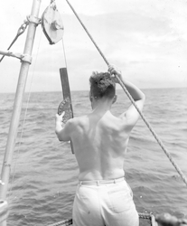 Fritz Fuglister measuring angle of hydro wire on Atlantis.