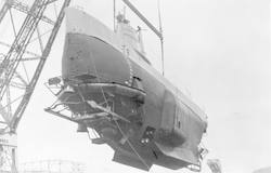 Archimede suspended by a crane