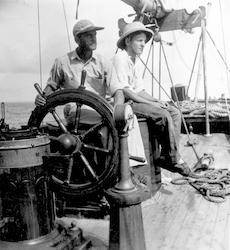 Stan Poole and son aboard Caryn