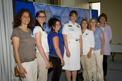 The current WHOI Women's Committee with the guest of honor.