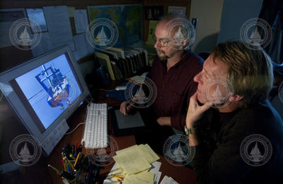 Jim Broda (front) and Jack Cook working on the long core proposal animation.