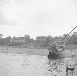 Boat on beach in Vineyard Haven after Hurricane Carol.