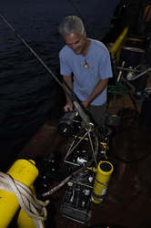 Cabell Davis working on holographic imaging instrument in the Gulf.