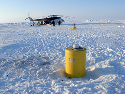 ITP in place on the ice with a helicopter and AOFB in the background.