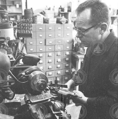 Otis Hunt working in the machine shop.