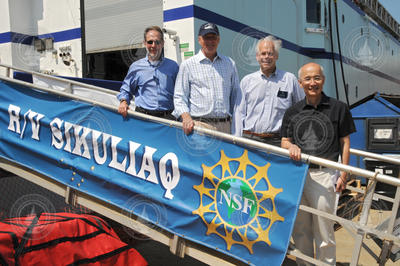 Rob Munier, Congressman Keating, Larry Madin, and Roger Wakimoto.