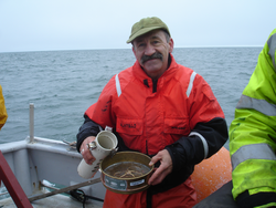 Phil Alatalo processes a plankton net sample collected in the  Chukchi Sea.