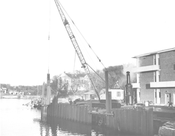 Crane being used during construction of Redfield Laboratory.