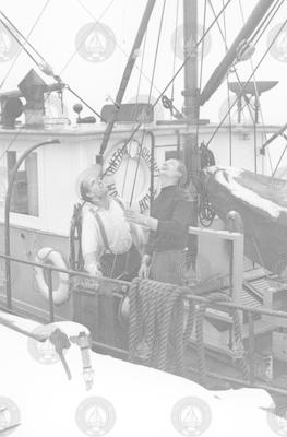 Two men on deck of Anton Dohrn in the winter