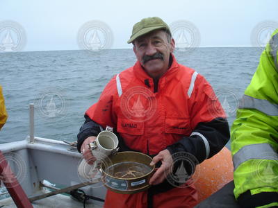 Phil Alatalo processes a plankton net sample collected in the  Chukchi Sea.
