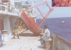 William Ostrom and Mel Briscoe on deck with large buoy