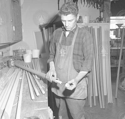 Art Costa working in carpenter shop.