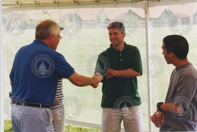 George Frisk, Sean McKenna and Derek Fong.