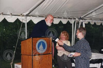 John Farrington and Judy McDowell congratulating Vladimir Osychny.