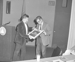 John Steele presenting Al Bradshaw a thirty years of service award.