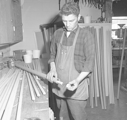Art Costa working in carpenter shop.