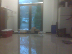 Water in basement of McLean building after heavy rains.