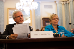 James Cameron and Susan Avery engaging with the panel of senators.