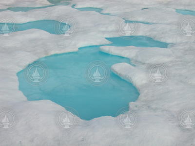 Azure melt pond in the Arctic.