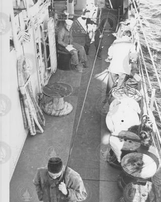 Unwinding cable on board USS Hazelwood to mark last dive of Thresher