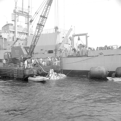Recovered Alvin being loaded onto barge