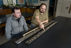 Camilo Ponton and his advisor Liviu Giosan analyzing a sediment core.