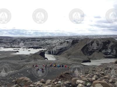 Field Trip participants take a break during a hike on the Iceland tour.