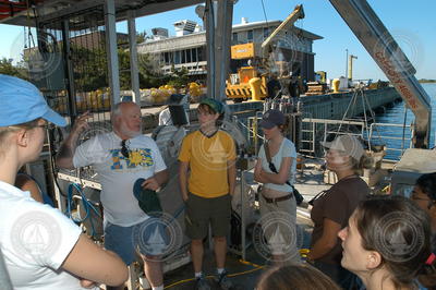 Bruce Tripp giving students preliminary orientation onboard Tioga.