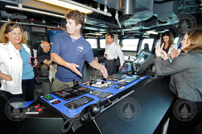 Captain Mike Hoshlyk showing NSF associates the bridge on R/V Sikuliaq.